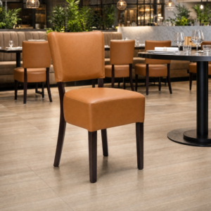 Alto FB Wenge Frame Fully Upholstered Dining Chair – Ochre Brown Faux Leather in Restaurant Setting