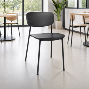 Black Preston Stacking Side Chair in a light cafe environment