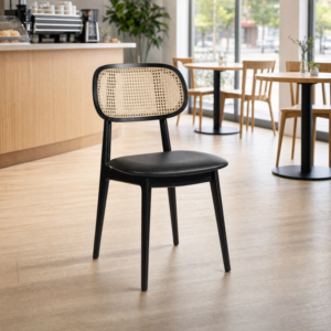 Relish Side Chair Black Stain Cane Back with Black Faux Seat Pad in a Cafe setting