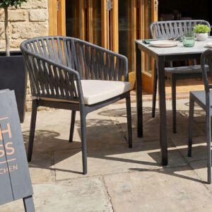 Portu Outdoor Arm Chair with Taupe Cushion - Stylish and Stackable