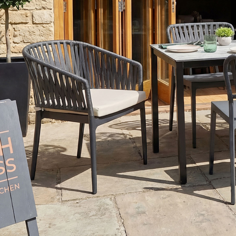 Portu Outdoor Arm Chair with Taupe Cushion - Stylish and Stackable